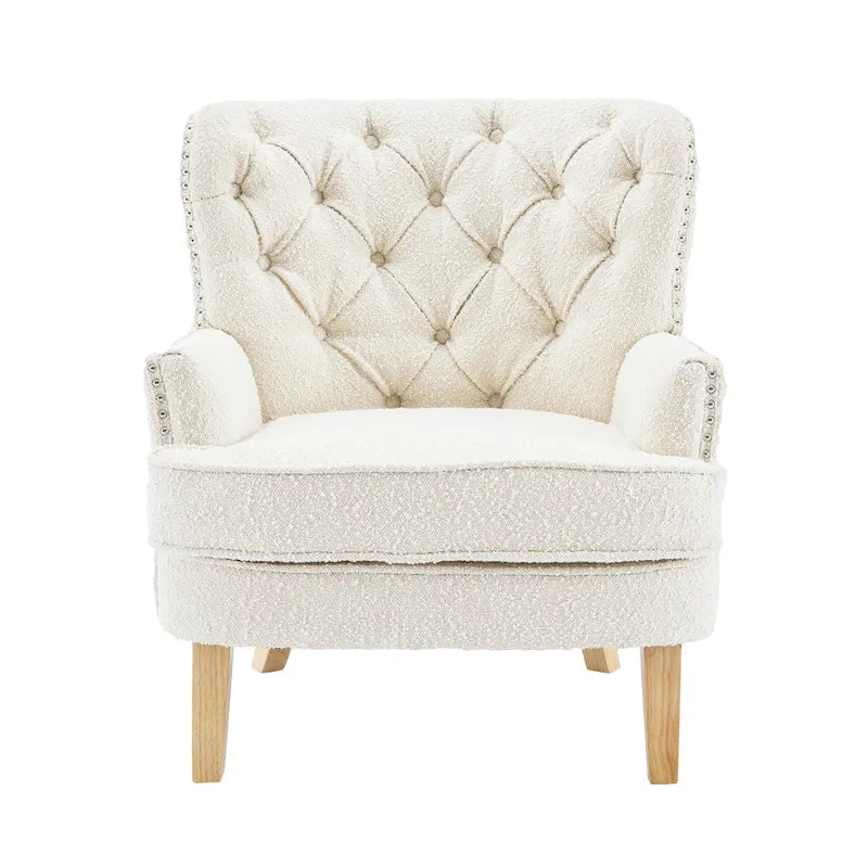 Fauteuil club clouté en bouclette amande