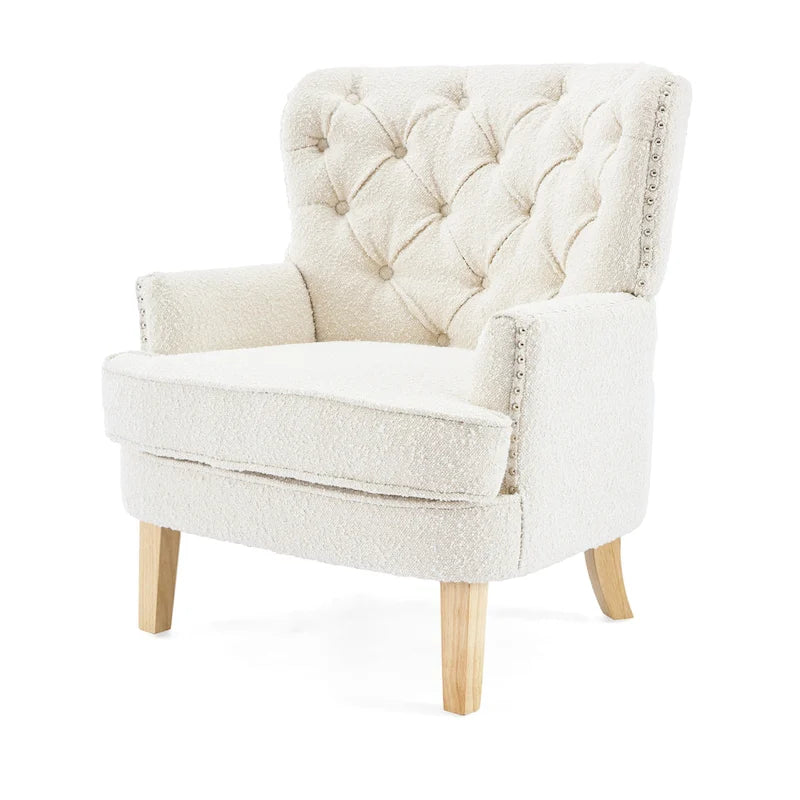 Fauteuil club clouté en bouclette amande