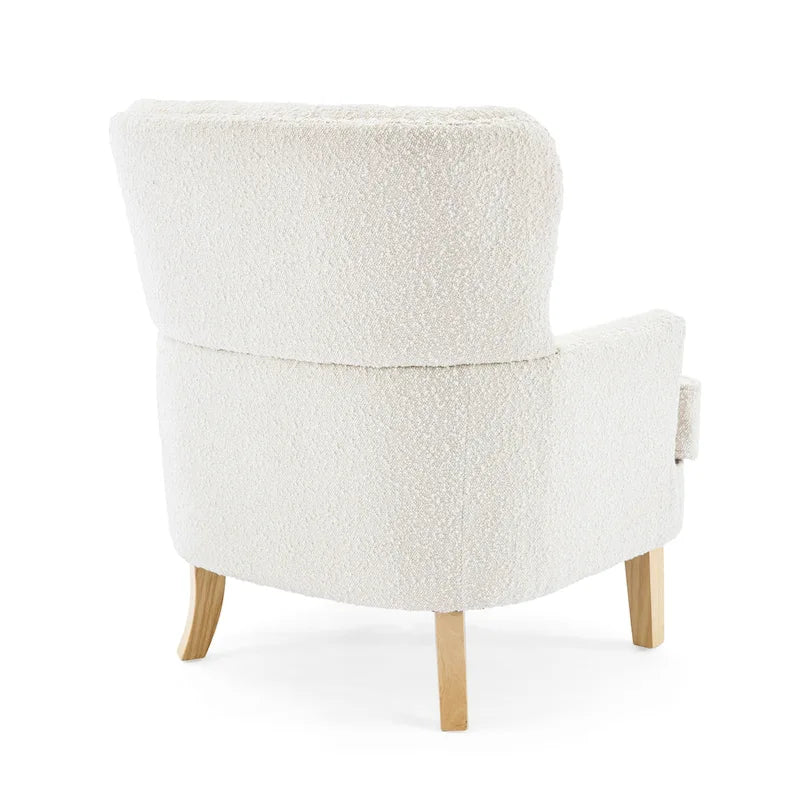 Fauteuil club clouté en bouclette amande